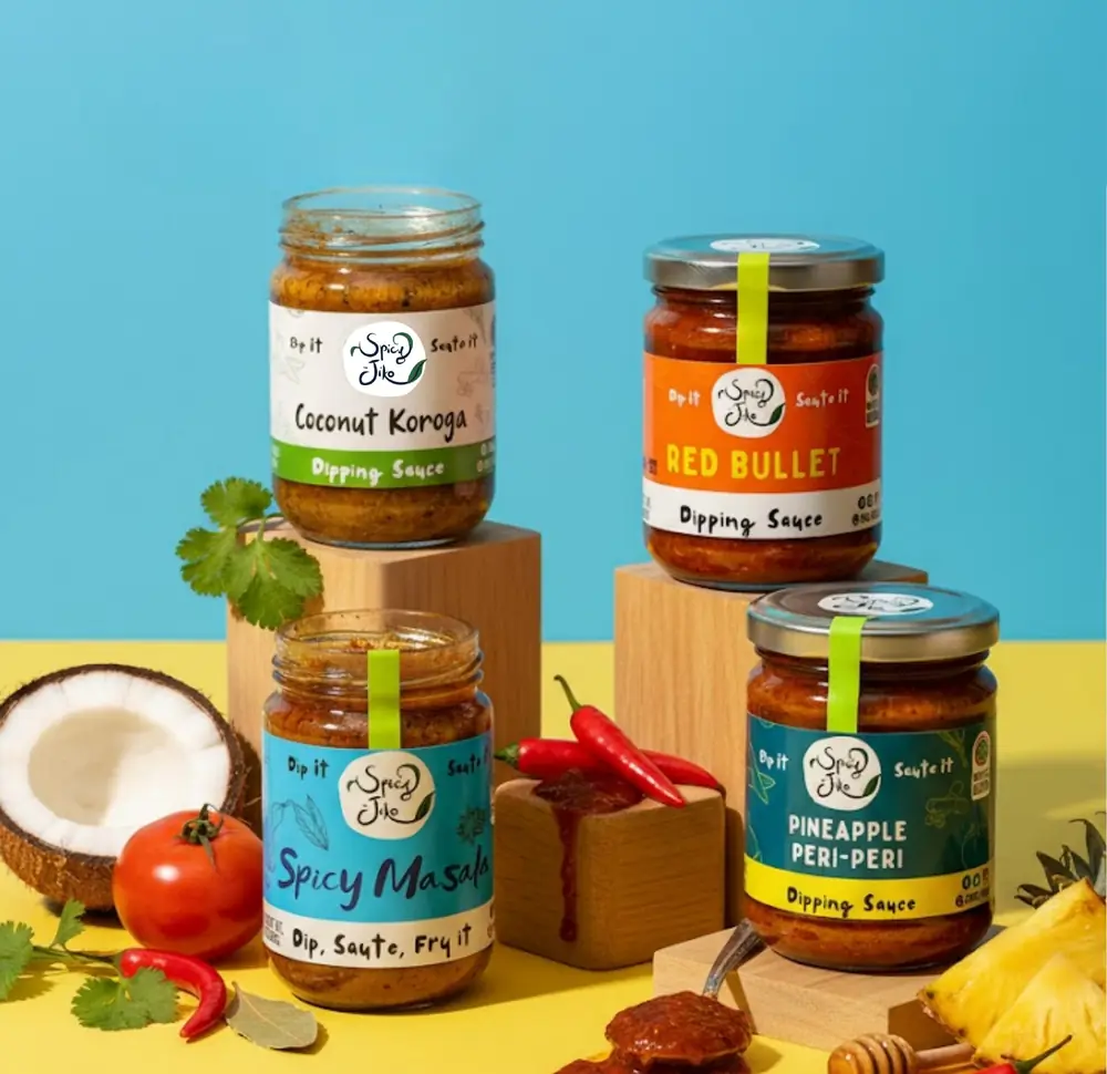 Coconut Koroga, Red Bullet, Spicy Masala and Pineapple Peri-Peri jars with coconut and chillies
